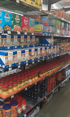 Shelf of sauces, cereals and pantry jars