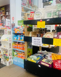 Shelf of snacks and everyday essentials